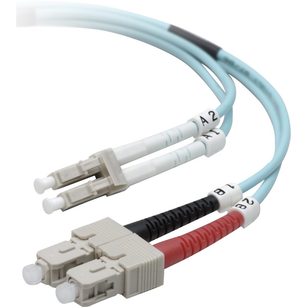 BLKF2F402L705MG - At a Glance:  Fiber optic patch cable for high-speed data connections Suitable for 10GB Ethernet network applications Backward compatible with existing network equipment Two LC and two SC connectors for rapid deployment Multimode optical fiber to transmit data over short distances  KEY FEATURES: 1. LC Duplex male connectors 2. SC Duplex male connectors 3. Multimode optical fiber LC AND SC CONNECTORS FOR QUICK DEPLOYMENT This fiber optic cable features two LC multimode male connectors on one end and two SC multimode male connectors on the other end for fast setup. LC connectors conserve space to accommodate multiple cables. TRANSMIT DATA WITH EASE Establish high-speed data connections within your local area network using the Belkin 10GB Multimode 50/125 LC/SC Fiber Optic Patch Cable. Designed for use in 10 Gigabit Ethernet network applications, the multimode patch cable is backward compatible with existing network equipment and offers three times the bandwidth of traditional 62.5/125 multimode fibers. MULTIMODE FIBER FOR BACKBONE APPLICATIONS Ideal as part of a backbone network, this fiber patch cable uses laser-optimized fiber that has a larger diameter and greater light-gathering capacity than a single-mode fiber. With a core diameter of 50 microns and a cladding diameter of 125 microns, this fiber is better suited for transmitting data over short distances, such as within an office building. MEETS INDUSTRY REQUIREMENTS The Belkin 10GB Multimode 50/125 LC/SC Fiber Optic Patch Cable is classified as an OM3 multimode optical fiber cable under ISO/IEC (International Organization for Standardization/International Electrotechnical Commission) standard 11801. Package Includes:  10GB Multimode 50/125 LC/SC Fiber Optic Patch Cable 