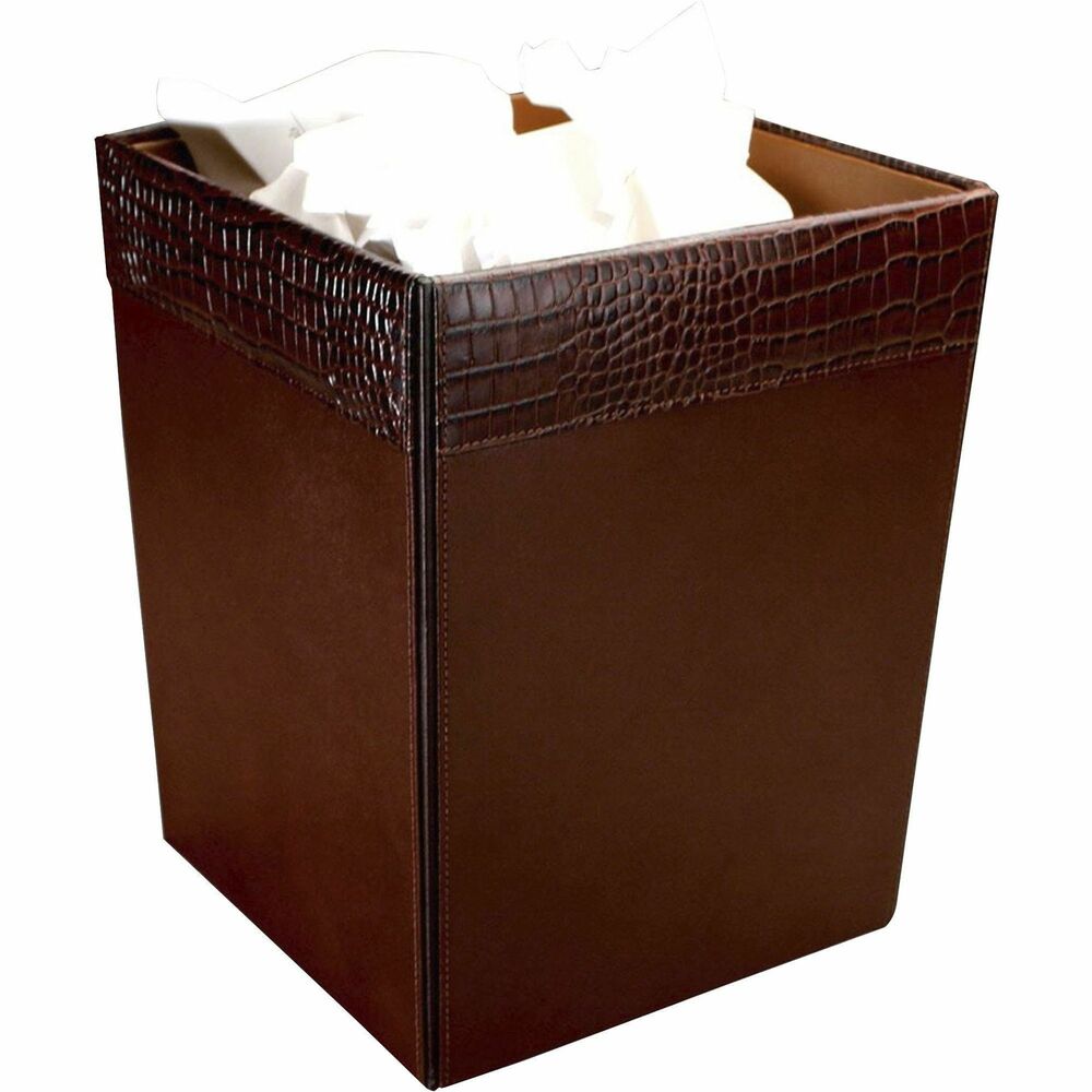 DACA2003 - Brown Crocodile Embossed Leather Waste Basket features a textured rim to complement the polished, professional look of your room. The bottom is lined with soft velveteen to protect surfaces from scuffs and scratches. 14-quart wastebasket is designed for waste paper products. Wastebasket coordinates with Dacasso's line of conference room items and leather desk accessories. It's perfect for any office, conference room, study room, hotel and more.