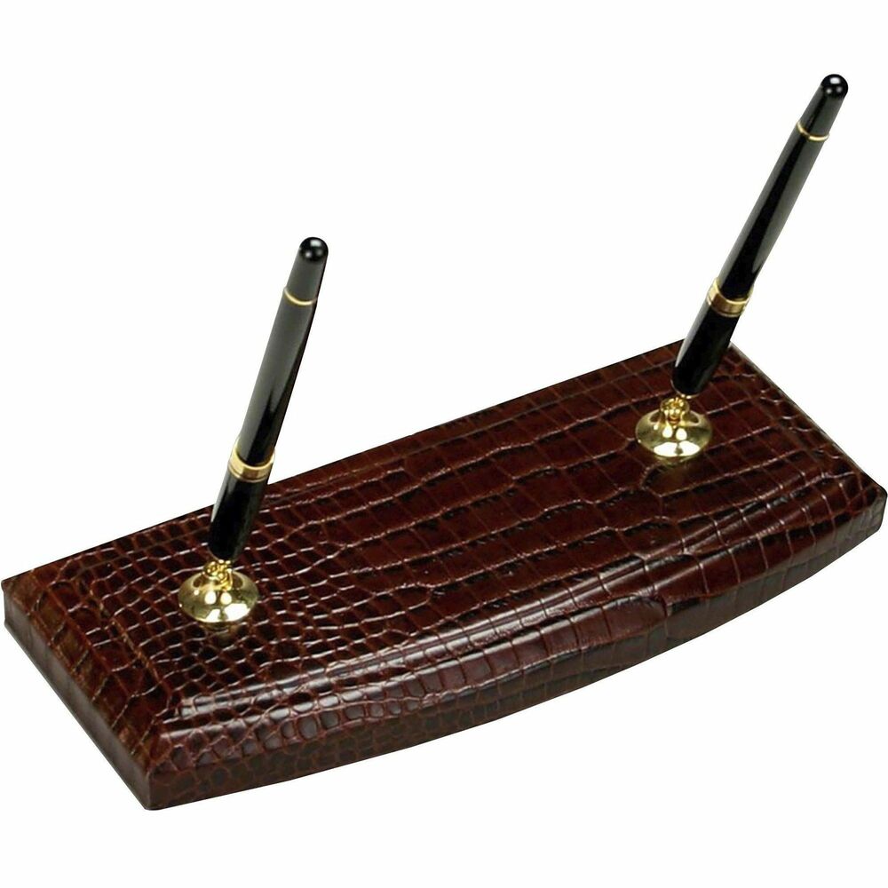 DACA2004 - Double Pen Stand features a crocodile embossed design to add a smart, sophisticated look to your desk. Leather adds professional style to any work space. Soft velveteen protects surfaces from scuffs and scratches. Pen stand includes black rolling ball pens. Pens accept Pentel Excalibur, Itoya and Mont Blanc 163 rolling ball pen refills.
