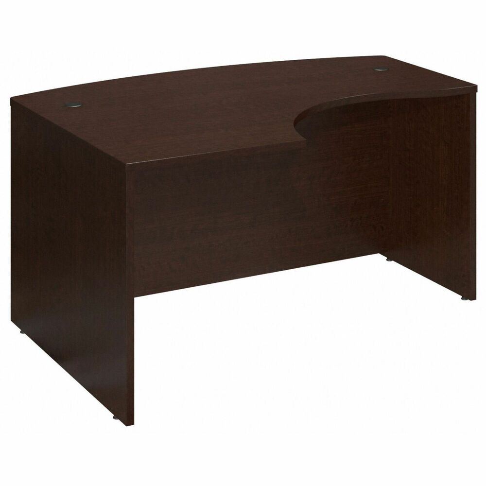 BSHWC12933 - Expand your worksurface with this left-hand, L-Bow desk shell in Mocha Cherry for classic styling that offers clean lines and an extended modesty panel. It is constructed with 100 percent thermally fused laminate for durability and superior resistance to scratches and stains. Create an expansive corner workstation with any Bush Business Furniture Series C Credenza or Return Bridge on the left-hand side of the desk. You'll enjoy the integrated wire management located within both desktop and leg grommets to conceal cables and keep your desk area uncluttered. Spacious design includes room for two-drawer or three-drawer mobile pedestals (sold separately) and can be customized with desktop accessories like a keyboard tray for convenience. Compensate for uneven floor surfaces with adjustable levelers.