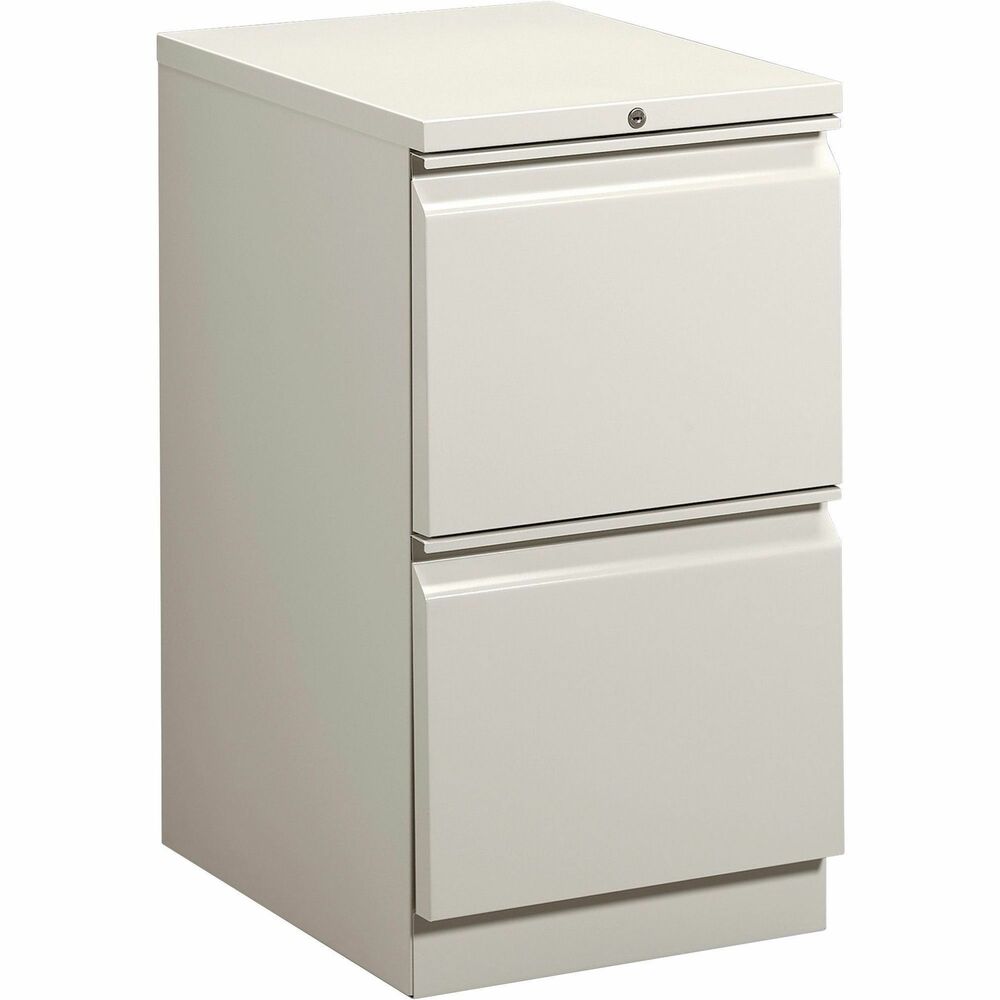 HON33823RQ - Mobile pedestal with HON Brigade Series 800 lateral-pull design fits under standard HON Initiate, 38000 Series and 29-1/2" worksurfaces. Freestanding pedestal offers a 22-7/8" depth and two file drawers with ball-bearing suspension (90 percent extension). High-sided file drawers feature two crossrails and accommodate front-to-back filing for letter-size, hanging file folders. Counterweight inhibits tipping when opening more than one drawer. Light gray pedestal is also equipped with a HON One Key interchangeable, core-removable lock; fixed front casters; and swivel rear casters. Pedestal meets or exceeds ANSI/BIFMA and ISTA performance standards.
