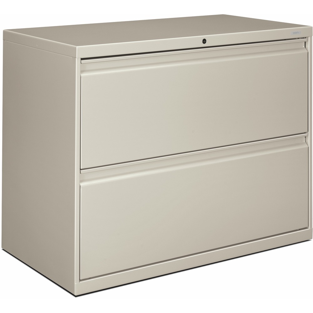 HON882LQ - Two-drawer lateral file offers clean lines, reinforced case construction, 36" width, dual side locks for security, and full-width, designer-style handles. Baked enamel finish over rust-inhibiting, phosphate pretreatment adds more durability. Three-part, telescoping, ball-bearing suspension delivers smooth drawer operation. Drawers accommodate letter-size or legal-size folders from side-to-side with included adjustable hangrails. Drawers are flush at the top and sides and feature drawer-extension restraint. Mechanical interlock allows only one drawer to open at a time. Light gray lateral file also offers four adjustable leveling guides for stabilizing and HON One Key interchangeable, core-removable lock. Lock mechanism secures both sides of drawers.