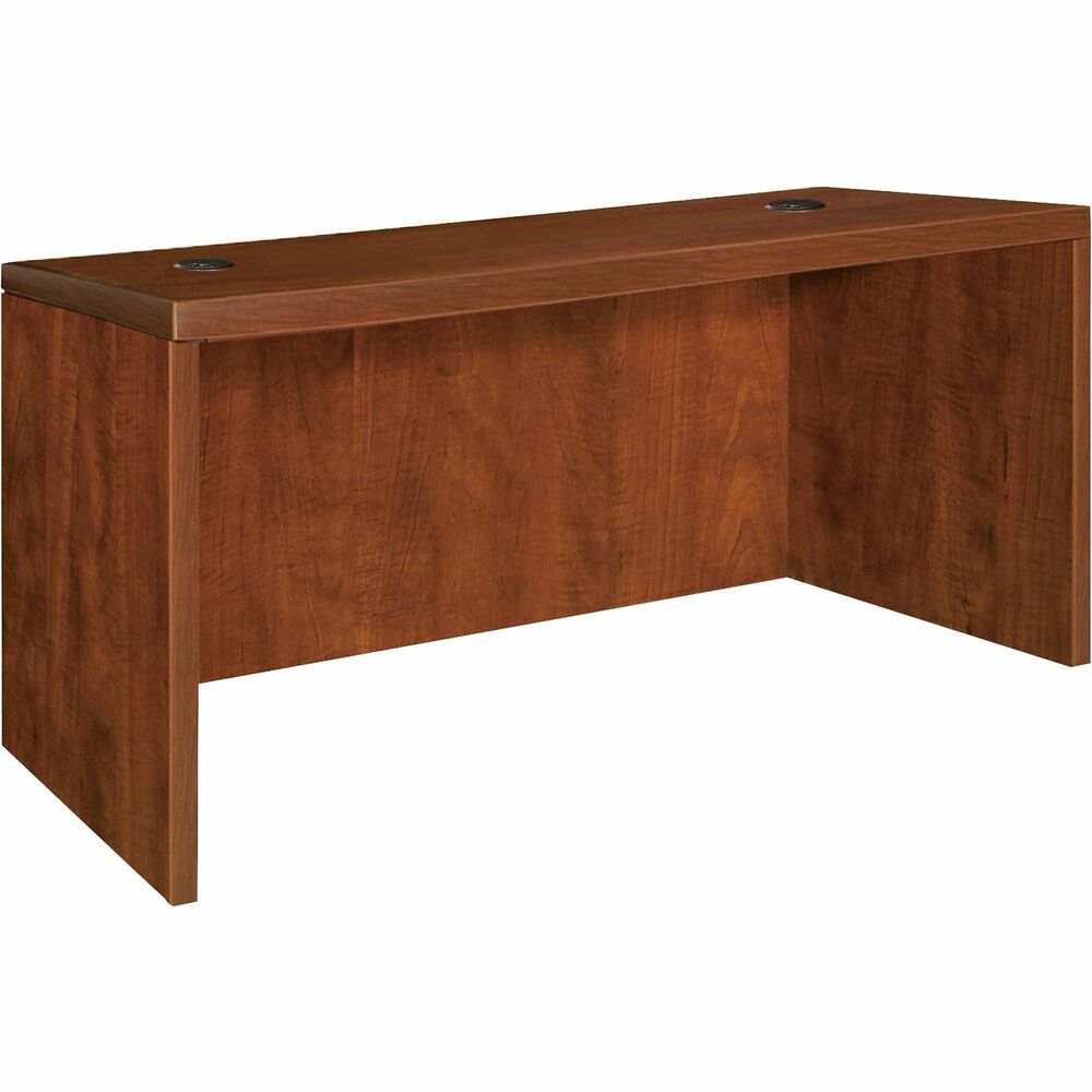 LLR69903 - Rectangular desk shell is part of Lorell Essentials Series Laminate Furniture with high-quality laminate construction and metal-to-metal, cam-lock connections. Cherry laminate top is 1" thick for durability. Use the two grommet holes in the top for easy cord routing. Design also includes a full modesty panel for privacy, 3mm PVC edges and adjustable feet.