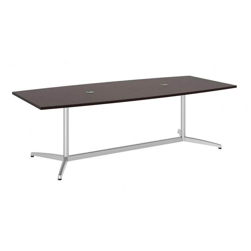 BSH99TBM96MRSVK - Bring your team together in an open or private office space using this Boat-Shaped Conference Table with metal base. Spacious design comfortably seats your team in a variety of environments from boardrooms to executive offices or any collaborative setting. Contemporary metal base in silver provides durability and includes adjustable levelers for a stable design on any floor. Continuous edgebanding protects against nicks and dings from collisions. Thermally fused laminate finish on the 1" thick top resists stains and scratches throughout years of everyday meetings while a finished underside helps prevent snagged clothing. Tabletop also includes a central wire-management grommet to accommodate cords and cables from a projector or speakerphone. This commercial-grade, conference room table is supported by a sturdy metal base for a 200 lb. capacity.