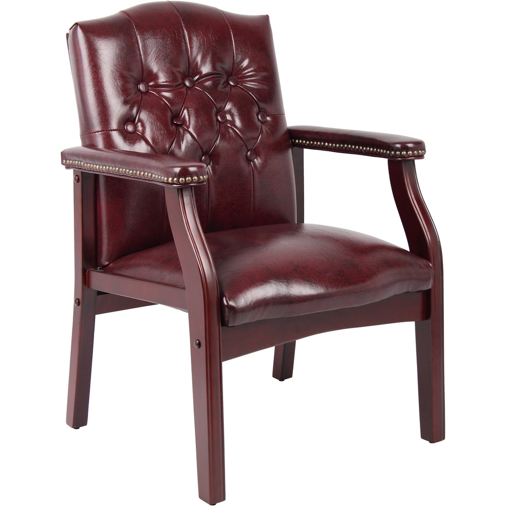 BOPB959BY - Traditional Executive Guest Chair is made with Caressoft Plus vinyl that is an ultra-soft, breathable upholstery. Material looks and feels like leather but is more durable and easy to clean. Strong, four-leg, mahogany base adds a pop of color and class to the chair. It sits at a fixed height and offers a weight capacity of 275 lb.