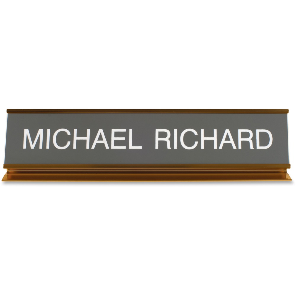 XSTK53 - Desk sign with a pedestal can show off your name or significant message. Choose from more than 35 fonts and more than 30 plastic insert colors. Contact customer service to customize your anodized aluminum, 2" x 10" sign with a gold frame.