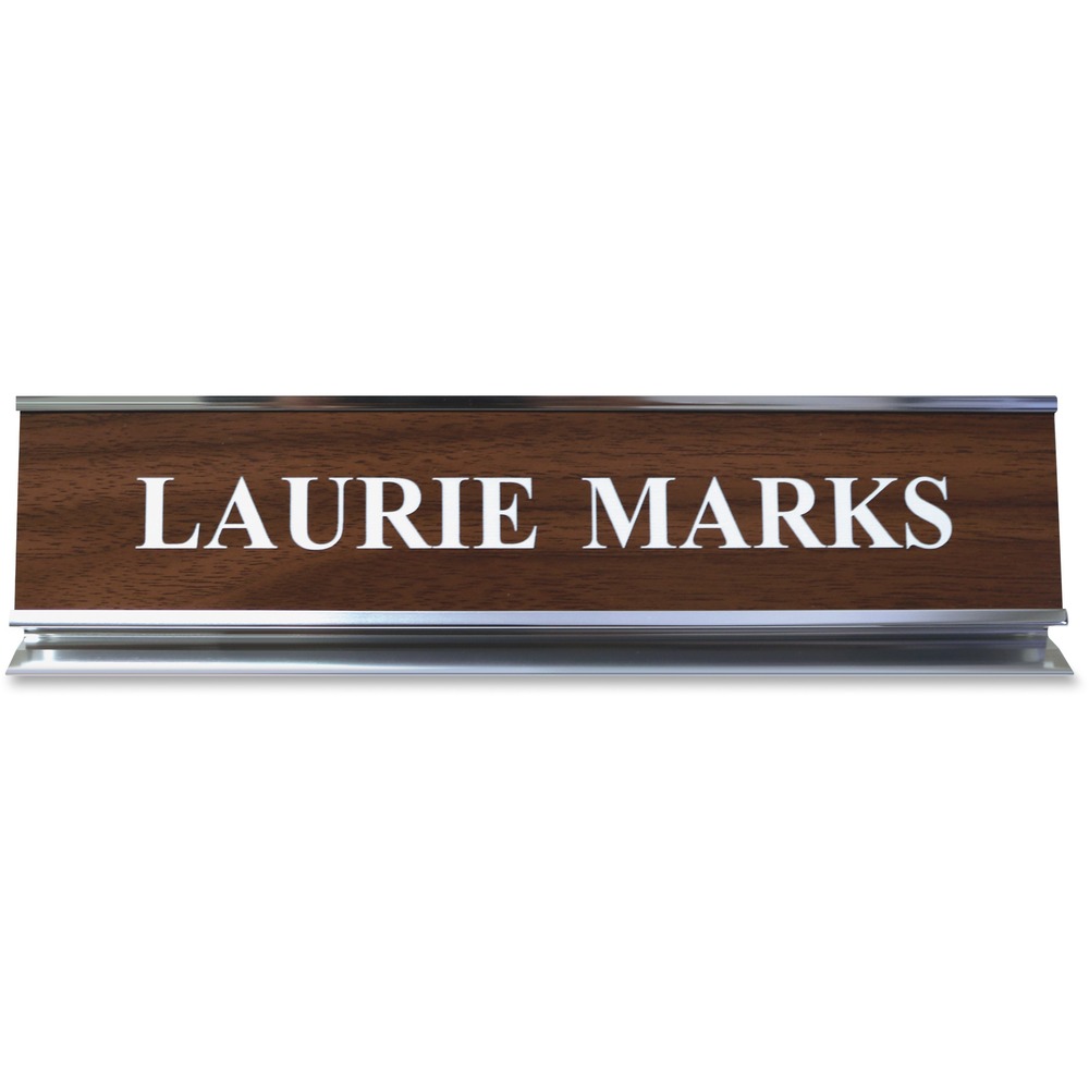 XSTK54 - Desk sign with a pedestal can show off your name or significant message. Choose from more than 35 fonts and more than 30 plastic insert colors. Contact customer service to customize your anodized aluminum, 2" x 10" sign with a silver frame.