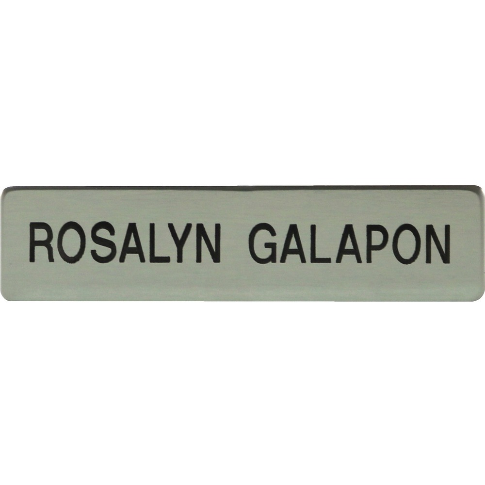 XSTJ51 - Keep your uniforms looking sharp with a metal uniform badge. This silver-colored badge with black lettering is perfect for military or any type of name badge. Use for any business uniform. Badge attaches with a military clutch fastener.