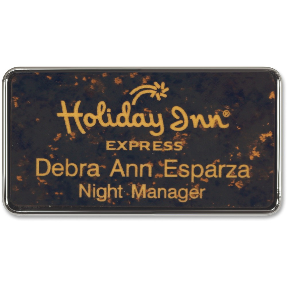 XSTJ68 - Framed name badge offers a clean, neat way to display your name. Silver-colored border frames your name for an elegant look. Badge measures 1-1/2" x 3". Large size allows rooms for a logo. Customize with a maximum of two lines and your choice of more than 35 fonts and 20 varieties of sign colors. Badge is made of high-grade, durable plastic.