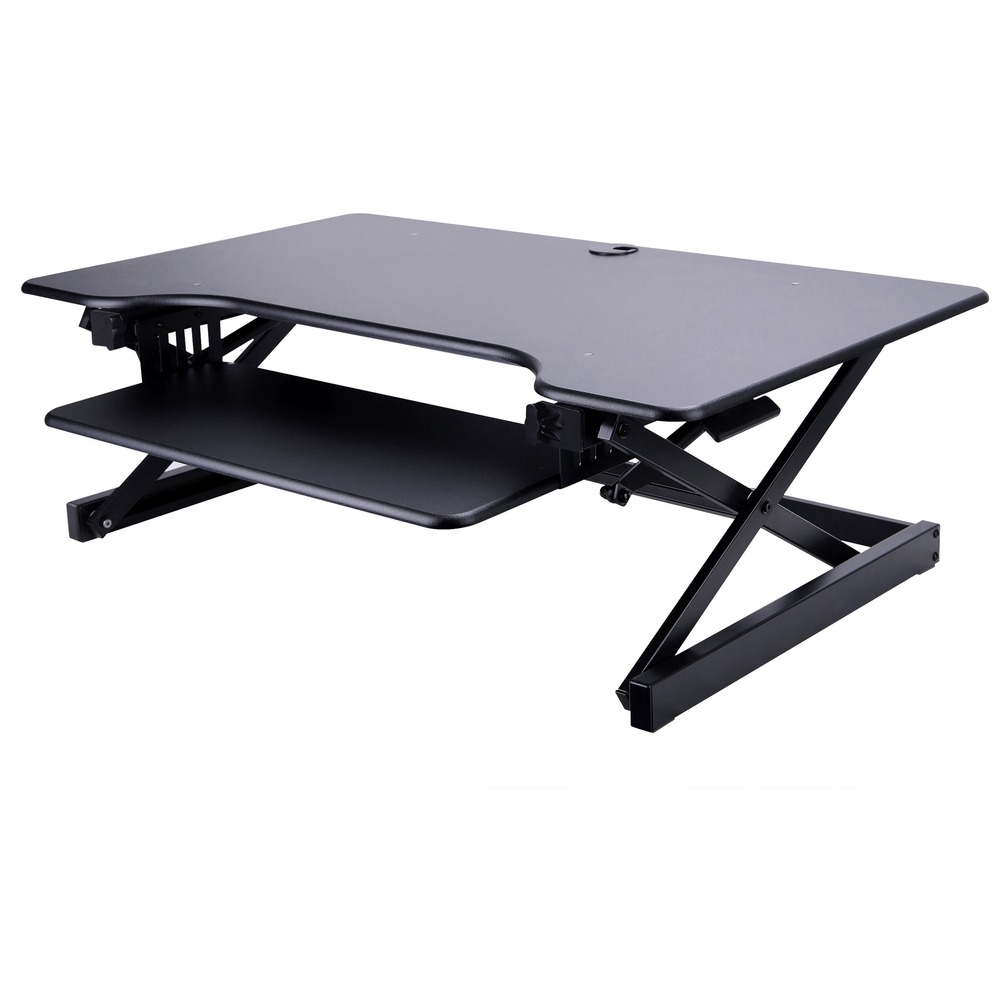 LLR99759 - Deluxe, adjustable desk riser offers a healthy addition to any desk, allowing you to sit or stand while you work. Large, 38" wide x 23-1/2" deep worksurface accommodates two monitors or a monitor and laptop. Ergonomic, retractable keyboard tray (25.5" wide x 11.25" deep) moves up and down vertically with the desk. Unlimited height adjustments range from 5" up to 20". Easily raise and lower with side handles. Gas shocks will assist, allowing you to easily move the desk up and down. Grommet hole allows you to route cables or add an optional monitor desk mount. Desk riser works with optional Deluxe Floor Stand (sold separately) to create a complete sit-to-stand desk or an extension to your current desk. Riser is fully assembled for use right out of the box.
