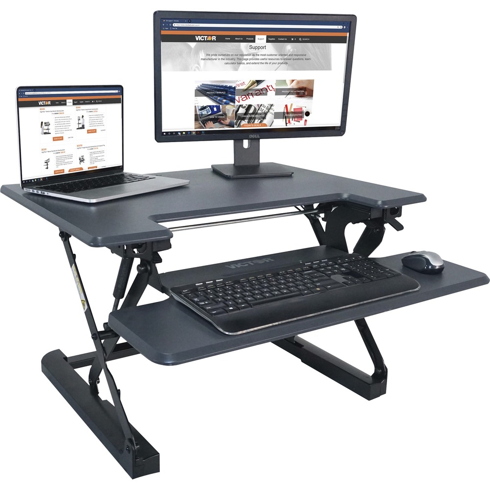 VCTDCX710G - High Rise Height-Adjustable Standing Desk with keyboard tray is a simple solution for too much sitting. It transforms any standard sit-down desk into a sit-stand desk. This workstation sits on top of your current desk or table and does not require clamping or attachment of any kind. Simply go from sitting to standing with an easy squeeze of the lever handles on each side of the worksurface. This two-tiered unit easily raises straight up and down. Perfect for any environment, the DCX710 can be used in the home, professional office or industrial workplaces. Large, 31" wide x 23" deep desk surface is accompanied by a 30" wide x 14" deep keyboard tray. Worksurface height raises to 21" , and the keyboard tray raises to 16-1/2" for an ergonomic working position. Gas-spring system allows smooth and stable height adjustment. Sleek wood construction and durable, scratch-resistant laminate coating will provide years of use. Compact footprint easily fits on the standard, 24" deep cubicle. More from the Manufacturer