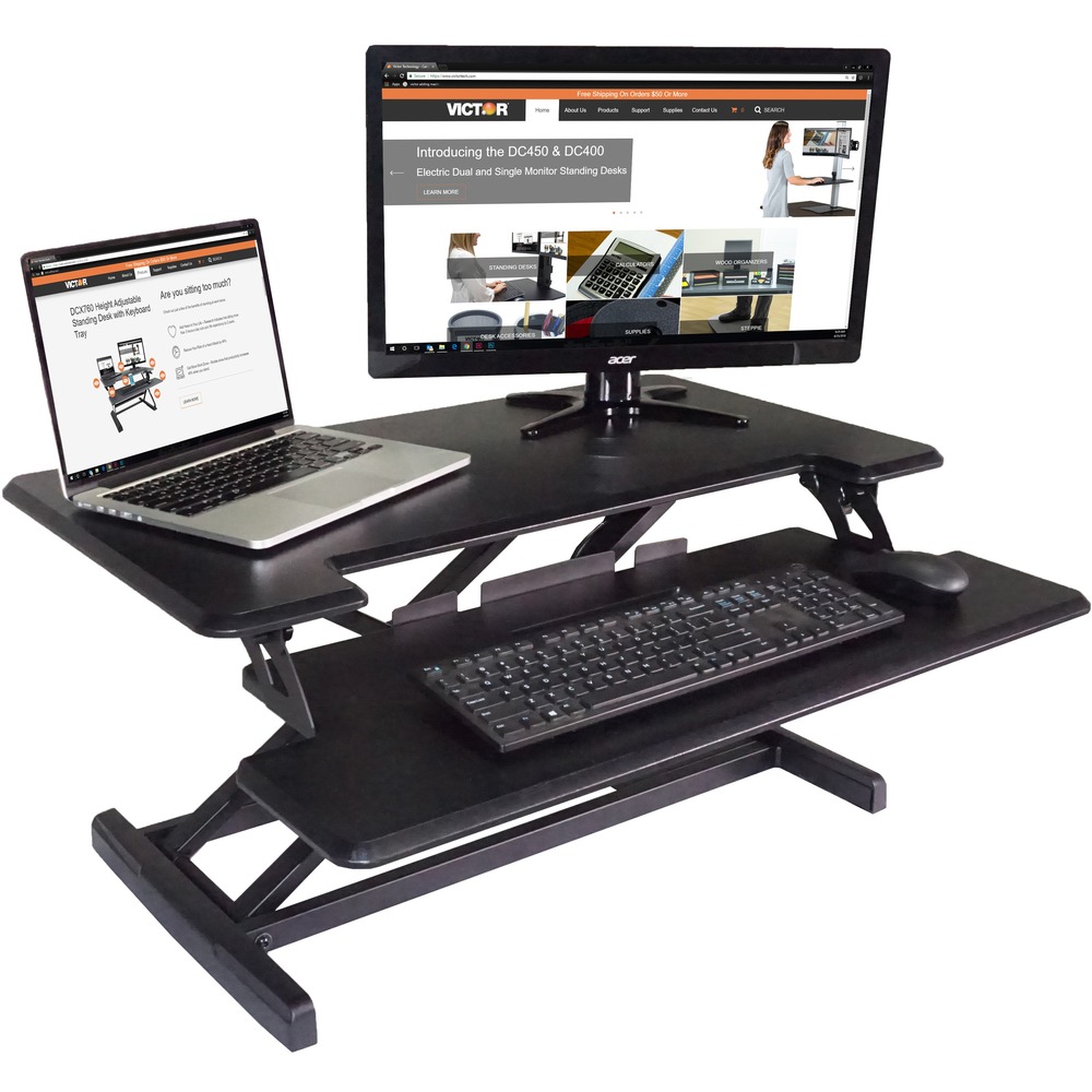 VCTDCX610 - Transform any sit-down desk into a standing desk using High Rise Height-Adjustable Compact Standing Desk with Keyboard Tray. Easily adjustable to your preferred height, this compact model ensures the correct ergonomic placement of monitors, keyboard, mouse and other accessories for optimal comfort. Two-tier desk riser elevates your working area up to 19" above your desk/table. Gas spring system allows smooth and stable height adjustment. Removable keyboard tray (32-1/2" x 13") offers a height range of 15". Desk riser worksurface features a grommet hole for attachable monitor mount. Sleek and sturdy wood construction with a durable laminate coating provides years of use. More from the Manufacturer
