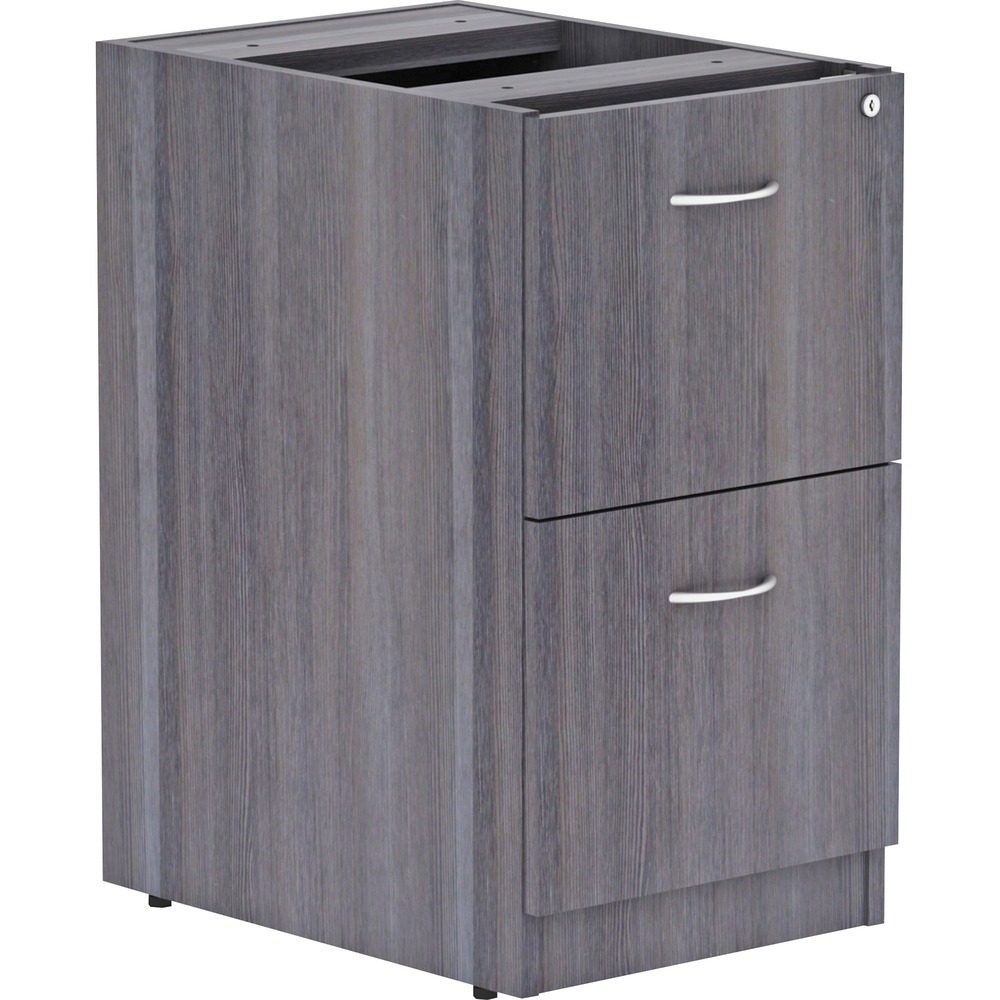 LLR69559 - Unfinished pedestal is part of Lorell Essentials Series Laminate Furniture with high-quality, Weathered Charcoal laminate construction. Pedestal includes two file drawers to store important files. Each file drawer includes hangrails and holds letter-size and legal-size hanging files. Design also includes heavy-duty, ball-bearing suspension; 96mm metal drawer pulls with a silver brush finish; and 3mm PVC edges. Pedestal should not be used without a top (sold separately). It attaches to the underside of the top of an Essentials Series desk, credenza or return with the included fasteners and extends to the floor. Adjustable floor guides offer stabilization.