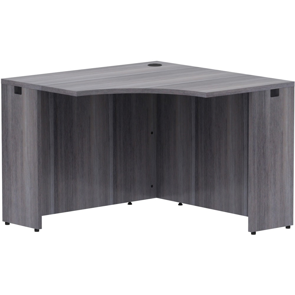 LLR69592 - Corner desk is part of Lorell Essentials Series Laminate Furniture with high-quality laminate construction and metal-to-metal, cam-lock connections. Weathered Charcoal laminate top is 1" thick for durability. Use the grommet hole in the top for easy cord routing. Design also includes a full modesty panel for privacy, 3mm PVC edges and adjustable feet.