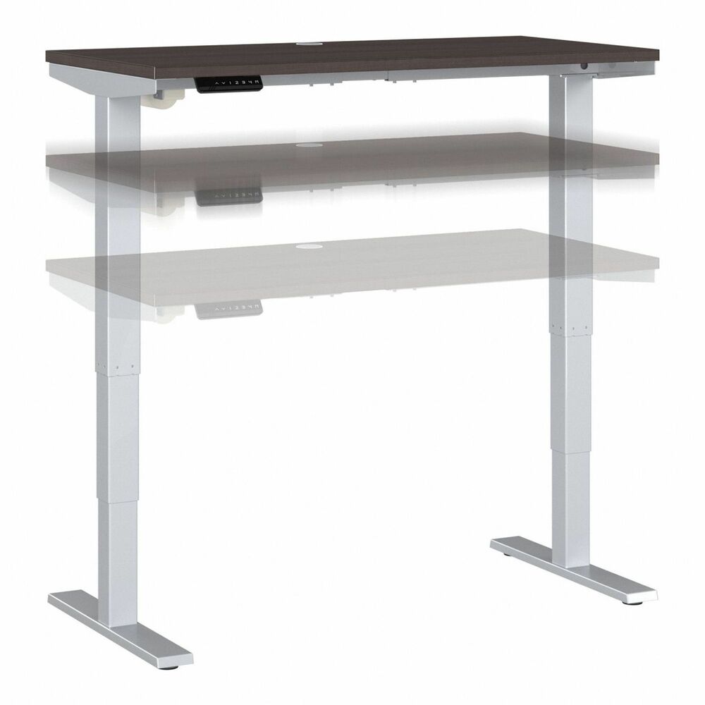 BSHM4S4824SGSK - Move 40 Height-Adjustable Standing Desk is a perfect way to build an ergonomic work space. Give your body and mind a break from sedentary work and enjoy a healthier, more productive office with the push of a button. Three stage units lift the 48" wide x 24" deep desktop anywhere from 28" to 48" from the floor at a speed of 1.25" per second so you can change positions without missing a beat. Anti-Collision Sensor stops movement up or down if an object is detected. Built to endure the rigors of a busy professional environment, the durable, thermally fused laminate surface is resistant to scratches and stains. Welded, 16-gauge steel base allows the desktop to support up to 176 lb. The 10' power cord plugs into a standard electrical outlet so the sit-stand desk can be used in virtually any setting, from an open floor plan to a private office. Stylish, Storm Gray finish is complemented by a Cool Gray Metallic base for a contemporary appearance that suits today's workplaces.