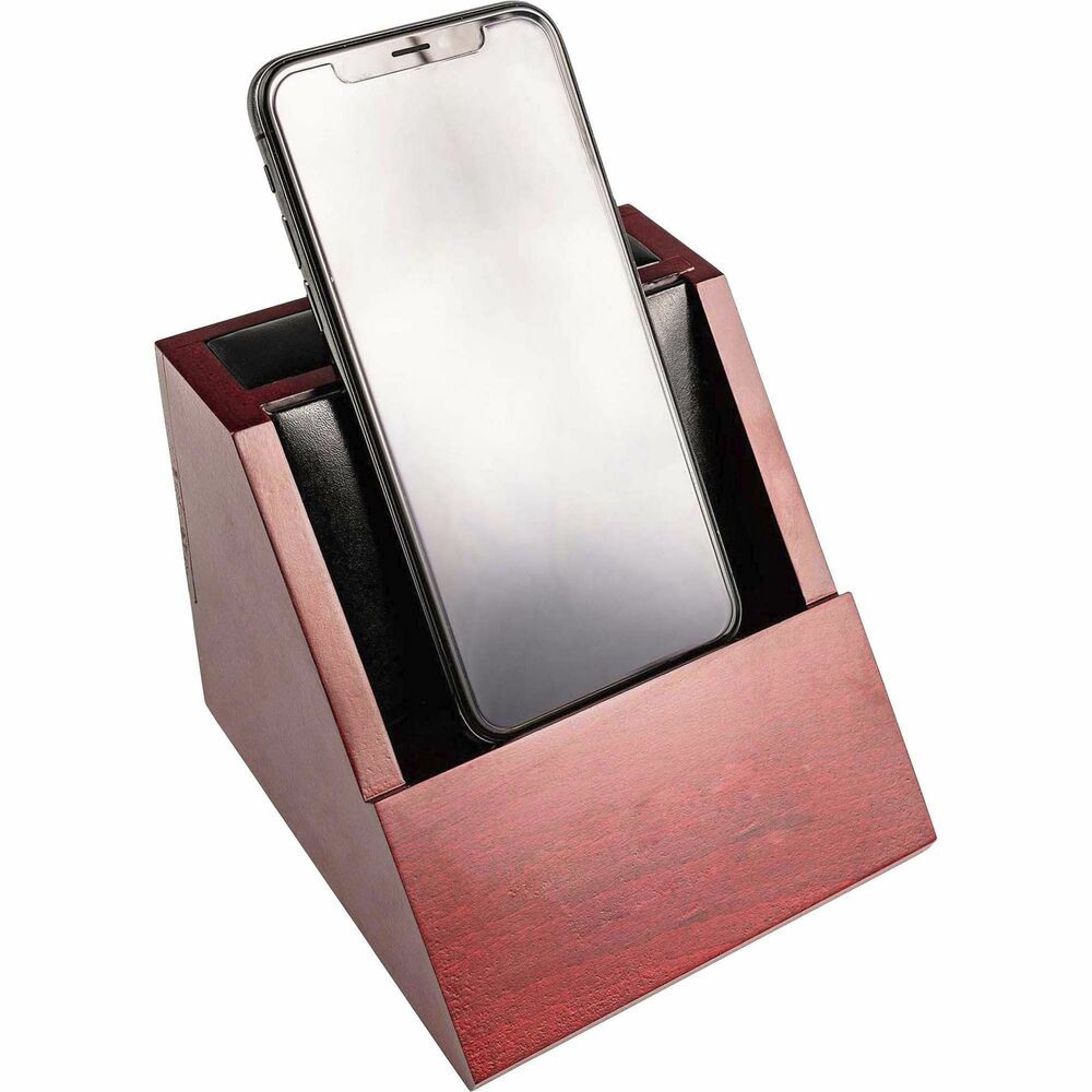 DACA8050 - Desktop Cell Phone Holder features an open-front design to provide enough room to hold a smartphone with a protective cover. Bottom opening provides enough clearance to connect a cell phone charger. Wooden construction and leather accents add professional style to any work space. Rubberized, foam dots protect surfaces from damage.