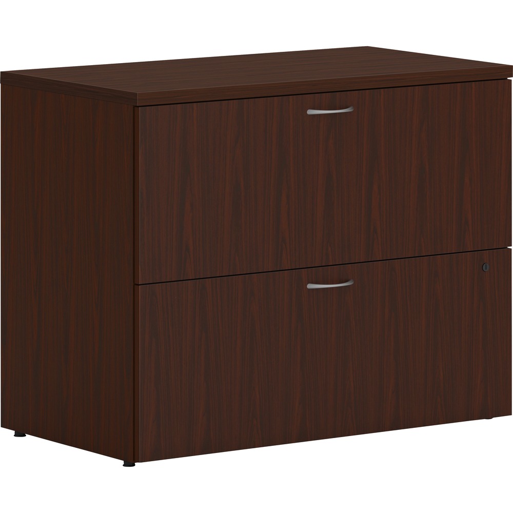 HONLLF3620L2LT1 - Two-drawer lateral file is part of the HON Mod Desk Collection that delivers simplicity and adaptability to enhance your productivity. The contemporary design feels perfectly at home in either a private office or an open floor plan. Lateral file can stand alone, or the top can be removed to convert it to a support pedestal for a Mod desk or credenza shell. It accommodates a large volume of filing in an efficient format that saves floor space, increasing the storage capacity of a workstation. Drawers are equipped with standard hangrails to hold either letter-size or legal-size hanging files. File folders are arranged side-to-side to take up less aisle space when drawers are opened. Steel ball-bearing, drawer suspensions operate easily and quietly. Leveling glides compensate for uneven floors. Durable laminate is scratch-resistant, spill-resistant and stain-resistant. Traditional Mahogany matches other Mod elements (sold separately) so you can create an office suite to fit your needs. More from the Manufacturer