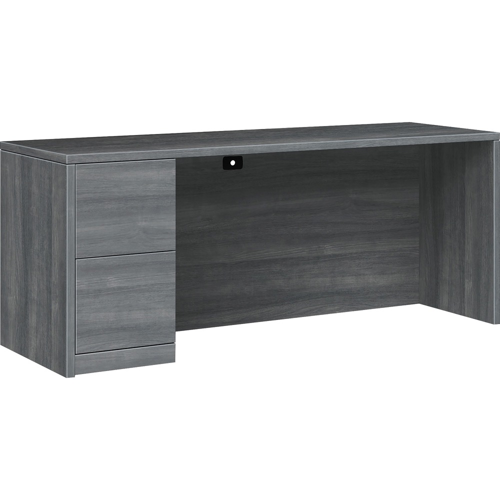 HON105904LLS1 - Single-pedestal credenza belongs to the HON 10500 Series Wood Laminate Furniture, a versatile collection for any office arrangement. Smooth, flat edges and a full modesty panel deliver a clean, streamlined look. Scratch-resistant, spill-resistant and wear-resistant laminate on strong inner-frame construction assures trouble-free performance and long life. Desk features one full pedestal on the left with two locking file drawers. File drawers include integrated hangrails for side-to-side letter-size and legal-size hanging folders and front-to-back letter-size filing. Both drawers have five-sided construction for added strength and easy alignment. Drawers operate on full-extension, ball-bearing suspension to ensure smooth, long-lasting operation. Credenza also has one-cord, passthrough grommet in the top center of the modesty panel to reach wall electrical outlets and interchangeable, core-removable lock for quick, easy rekeying. Center drawer for desk is sold separately.