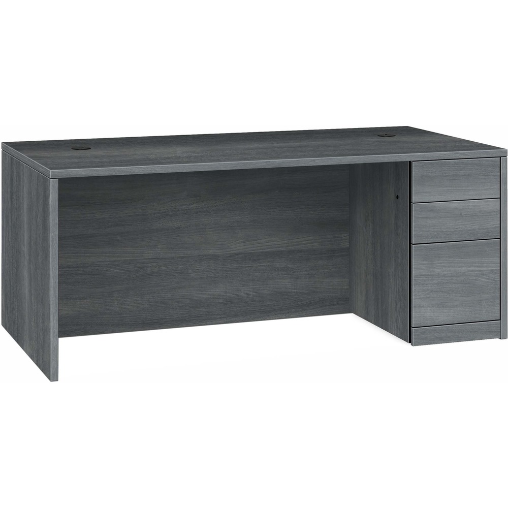 HON105895RLS1 - Right-pedestal desk belongs to the HON 10500 Series Wood Laminate Furniture, a versatile collection for any office arrangement. Smooth, flat edges and a full modesty panel deliver a clean, streamlined look. Scratch-resistant, spill-resistant and wear-resistant, Sterling Ash laminate on strong inner-frame construction assures trouble-free performance and long life. Desk features one pedestal on the right side with two box drawers for supplies and one file drawer for filing. All drawers feature five-sided construction for added strength and easy alignment or replacement of drawer fronts. Drawers operate on full-extension, ball-bearing suspension. File drawer includes integrated hangrails for side-to-side letter-size or legal-size filing and front-to-back letter-size filing. Desk also has a rectangular top; interchangeable, core-removable lock for quick, easy rekeying; and two 3" round grommets to route and hide wires and cables. Center drawer for the desk is sold separately.