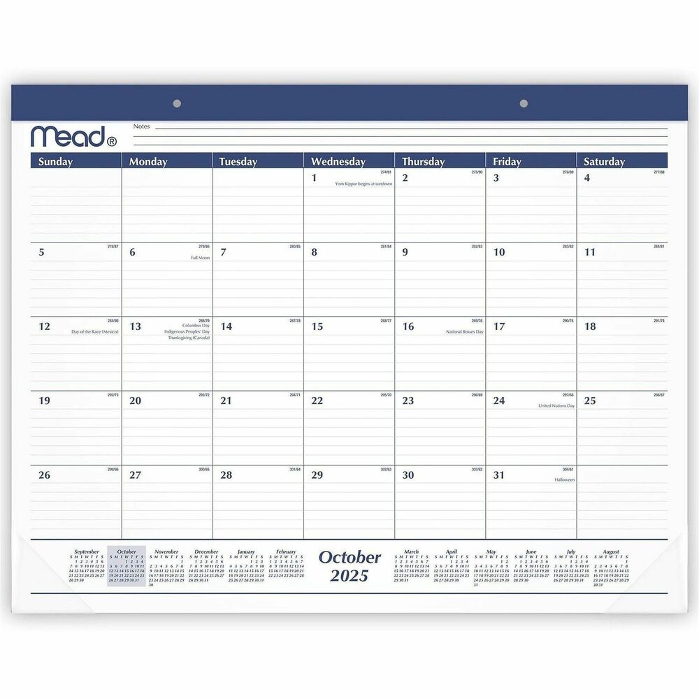 AAGCRM92020 - Protect your desktop and stay organized throughout the year with this monthly desk pad. Pages have ruled daily blocks and notes space to write down plans and reminders.  Desk pad covers a 15 month date range from October 2025 - December 2026 for yearly planning and beyond One month per page format has ruled daily blocks and space for notes. Pages measure 21 3/4" x 17". Daily blocks measure 2 15/16" x 2 3/8". Full year calendar reference is shown across the bottom of each page to check dates and deadlines as you plan Calendar has a blue headband and two eyelets for optional wall hanging Two clear corners keep pages flat while on desk or wall. Perforated pages for easy removal. 