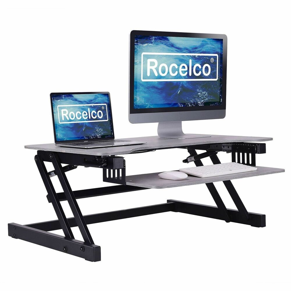 RCLRDADRG - The deluxe DADR Sit to Stand Desk Riser allows you to hold two monitors and/or a laptop. You can sit part of the day, but you can also stand and take advantage of all the health and productivity benefits that come with standing and moving around. Your DADR sits on your current desk, no need to buy new furniture. You can easily raise the large 37.5" x 20.5" desk and keyboard tray into continuous positions (up to 17" above your regular desk). The DADR is a sit to stand workstation that offers a 29.5" wide x 11.75" deep retractable keyboard tray that allows you to get into the most comfortable ergonomic position. It also includes a grommet hole for a single (Rocelco DM1) or double (Rocelco DM2) monitor arm or to organize cables. The DADR Ergonomic workstation provides gas piston lift assist that allows you to easily raise up to 35lbs. Fully assembled and ready to go!