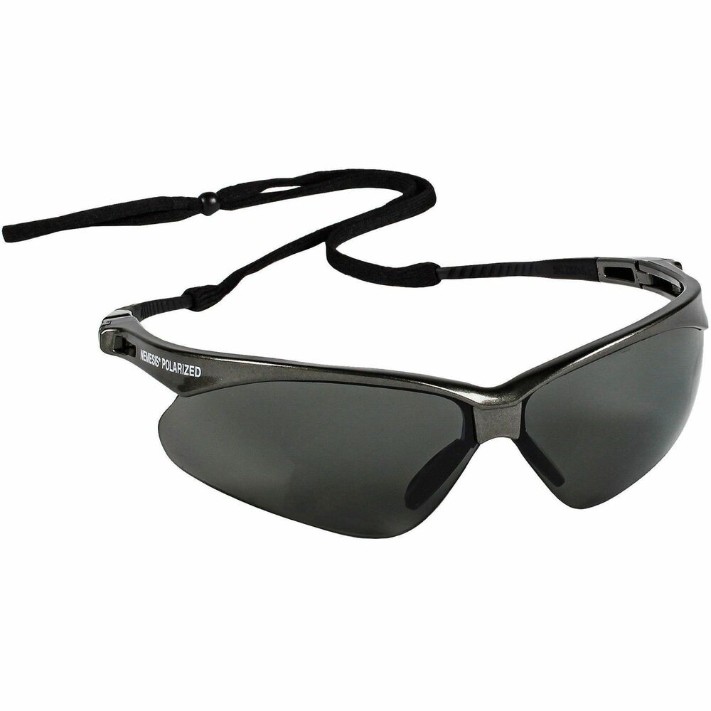 KCC28635 - V30 Nemesis Safety Glasses offer stylish good looks and a durable, lightweight construction that's great for protection both at work and home. KleenGuard Personal Protective Equipment enables rather than inhibits maximum productivity and safety for you and your employees. Polycarbonate lenses provide 99.9 percent UVA/UVB/UVC protection to help prevent eye damage like cataracts, retinal damage and other conditions that can cause temporary vision loss. Polarized smoke lenses meet EN 1836 standard for polarization. Wraparound frame has a base curve of 8 that extends the range of peripheral protection as well as soft-touch temples for comfort. Unisex safety glasses have an extremely flexible, patented nose piece to channel sweat away from your eyes and help prevent slippage down the nose. Each pair of safety glasses comes with a neck cord to keep close and protect your eyes at a moment's notice. Safety eyewear complies with the ANSI/ISEA Z87.1 plus standard for personal eye protection.