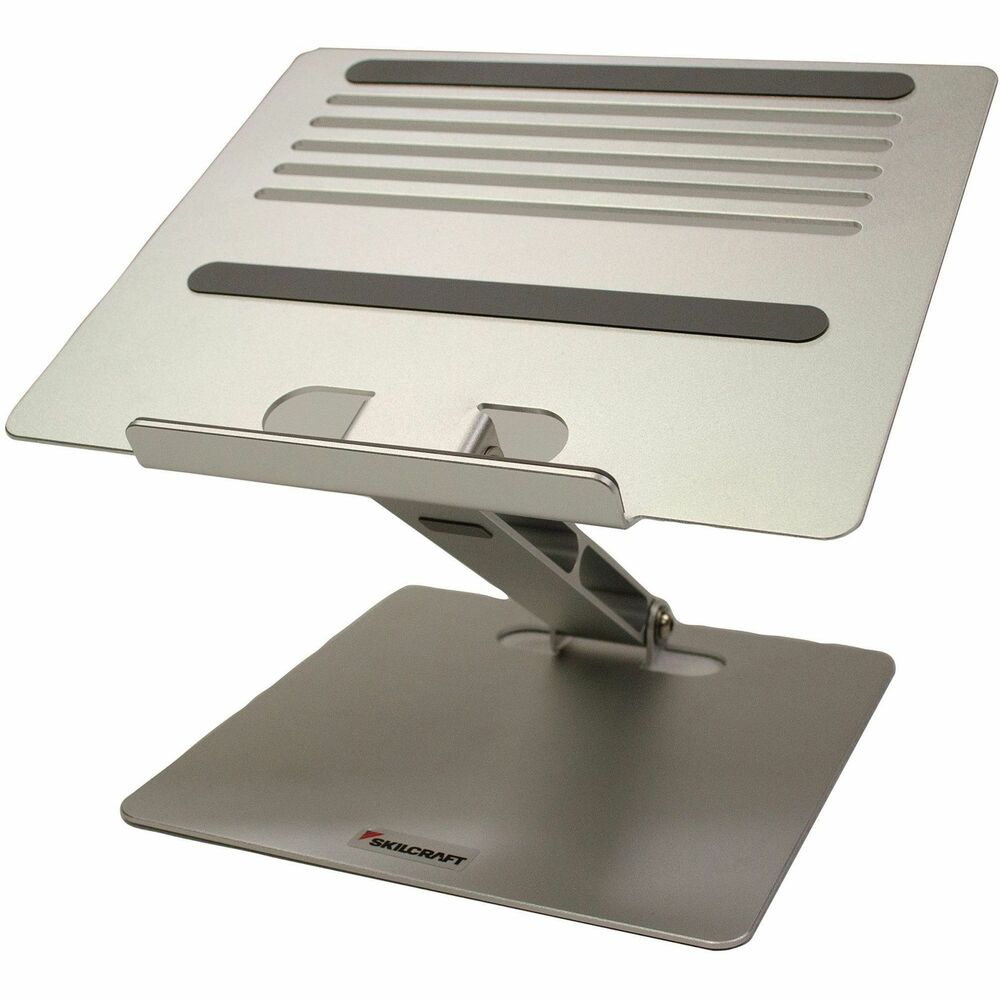 NSN7136390 - Raise your laptop to eye level with this laptop riser to enhance your productivity. It elevates any size laptop or tablet to an ergonomic screen position. 9-1/2" wide stand is made of sturdy, lightweight aluminum. It is angle-adjustable and height-adjustable and folds flat to easily store. Vented design prevents overheating. Anti-slip pads keep your device in place.   