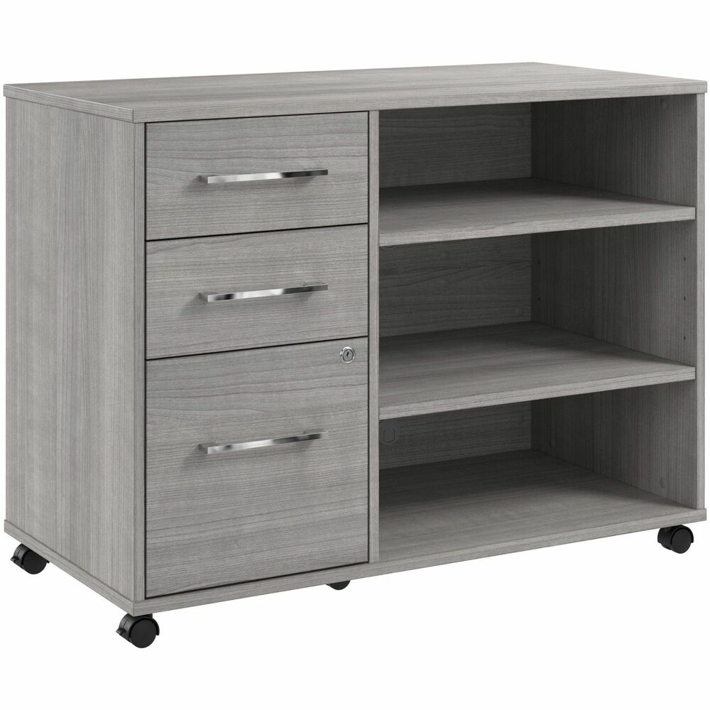 BSHHUF140PG - Hustle Office Storage Cabinet with Wheels provides the form and function needed to support your entrepreneurial spirit. An ideal choice for small to medium-size businesses and home offices alike, the small cabinet rolls effortlessly throughout your work space to provide storage where it's needed most. The left side features three drawers: one file drawer for letter/legal/A4-size paperwork and two box drawers to organize small office supplies. Drawers can be locked to safeguard documents with sensitive information as well as valuable items. Open storage area includes two adjustable shelves to accommodate work materials and equipment of various sizes plus two wire-management grommets. Dual-wheeled casters move the office cabinet to provide organization where it's needed most. Coordinating items in the Hustle Collection include a variety of computer desks in addition to a mobile filing cabinet, lateral file cabinet and five-shelf bookcase (none included).
