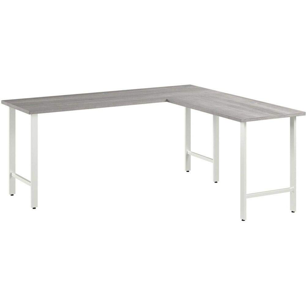 BSHHUS002PG - Hustle 72W x 24D L-Shaped Computer Desk with Metal Legs provides the form and function needed to support your entrepreneurial spirit. An ideal choice for small to medium-size businesses and home offices alike, each modern desk includes a bracket that allows workstations to connect as your needs evolve and expand. Spread out with materials and equipment on a durable worksurface with two built-in, wire-management grommets and a 200 lb. capacity. The L-shaped office desk's thermally fused laminate finish fends off scratches, stains and other cosmetic damage that occurs from daily use in a busy professional environment. Sturdy metal legs support the corner desk throughout years of everyday use; adjustable levelers compensate for uneven floors. Coordinating items in the Hustle Collection include a mobile filing cabinet, lateral file cabinet, storage cabinet and five-shelf bookcase (none included) to keep work materials and office supplies in order.