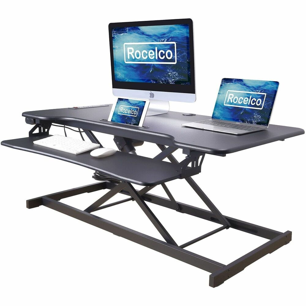 RCLREDRB46 - Electric sit-to-stand desk riser's ergonomic workstation encourages productivity by supporting sit-stand work and accommodating up to three 27" monitors or two 34" monitors. Benefits of alternating between sitting and standing while working include reduced back pain and a boost in overall health and energy. Work space features four AC outlets, two conveniently placed USB-A 2.0 ports, a USB-C port and 10.5" slot to hold a tablet or mobile phone. Full-size fixed keyboard tray measures 31.8" wide x 11.8" deep and can support anything from a keyboard to a laptop. Electric standing desk converter supports up to 35 lb. and adjusts in height from 4.7" to 21.7" , allowing people of all heights to work from an ergonomic position. Desk converter silently adjusts height at the touch of a button. Grommet hole on the rear of the work space provides hassle-free cable/wire management. Desk riser and converter exterior seamlessly match with the same sleek finish. Minimal assembly is required.