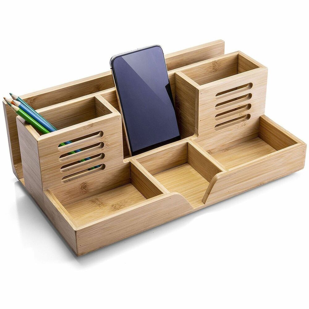 OIC71001 - Versatile Organization: Perfect for holding files, pens, pencils, small items like clips, phones, and more - keeps your desk tidy and organized. Modern & Natural Design: Crafted from bamboo with a simplistic and contemporary look, this organizer complements a variety of office settings and decor. 7 Storage Compartments: Features 7 compartments of various sizes, offering efficient organization for multiple types of office supplies and personal items. Improves Efficiency: Saves time by keeping all your supplies in the same location, making it easier to find what you need and stay focused. Sustainable & Durable: Made from high-quality bamboo, this desk organizer offers long-lasting durability and strength, ensuring it stands up to daily use.