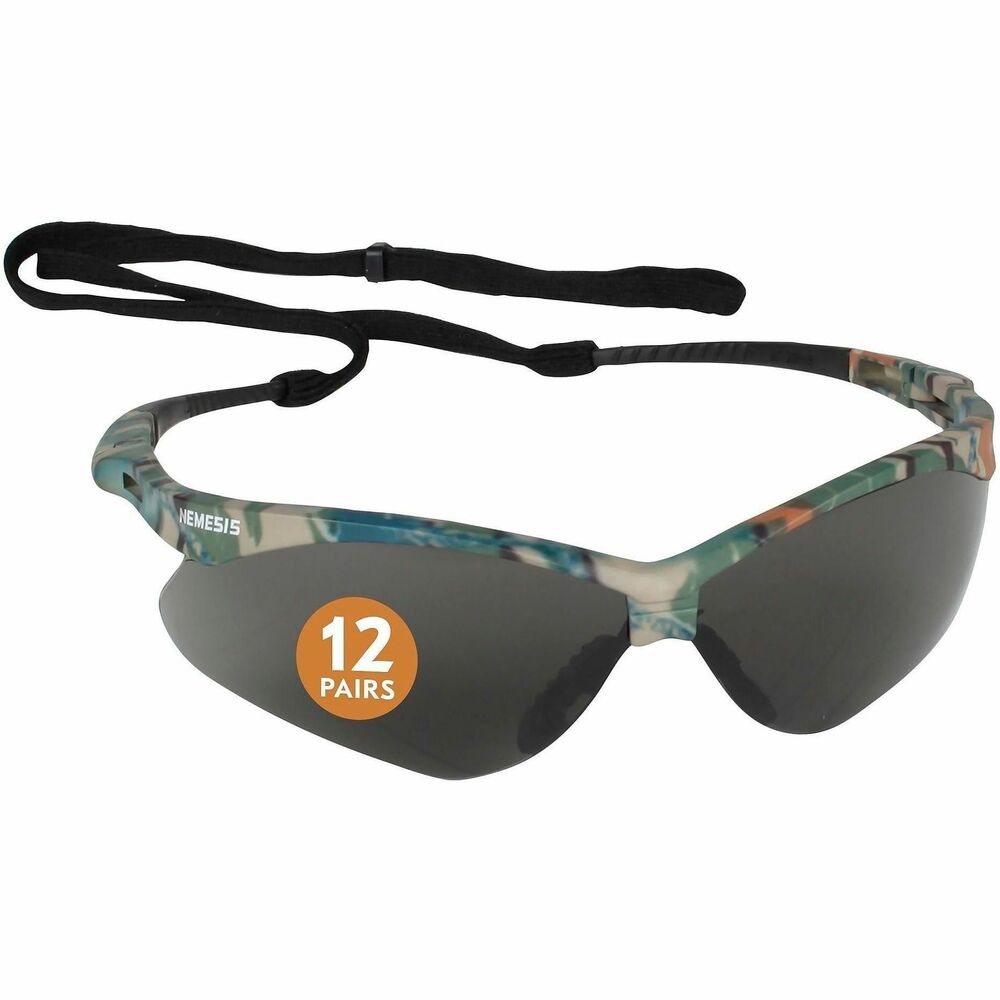 ANS22609 - Nemesis Safety Glasses with anti-fog coating provide effective eye protection and help prevent future eye damage and vision loss. Polycarbonate smoke-colored lenses offer 99.9 percent UV protection (UVA/UVB/UVC). Wraparound frames feature a base curve of eight and extend the rage of peripheral protection. Flexible nose piece design prevents slippage by channeling sweat away from the eyes. Included neck cord secures glasses to you. Sleek and modern safety glasses meet ANSIZ87.1+ standards and are ideal for construction, manufacturing and many other industries.
