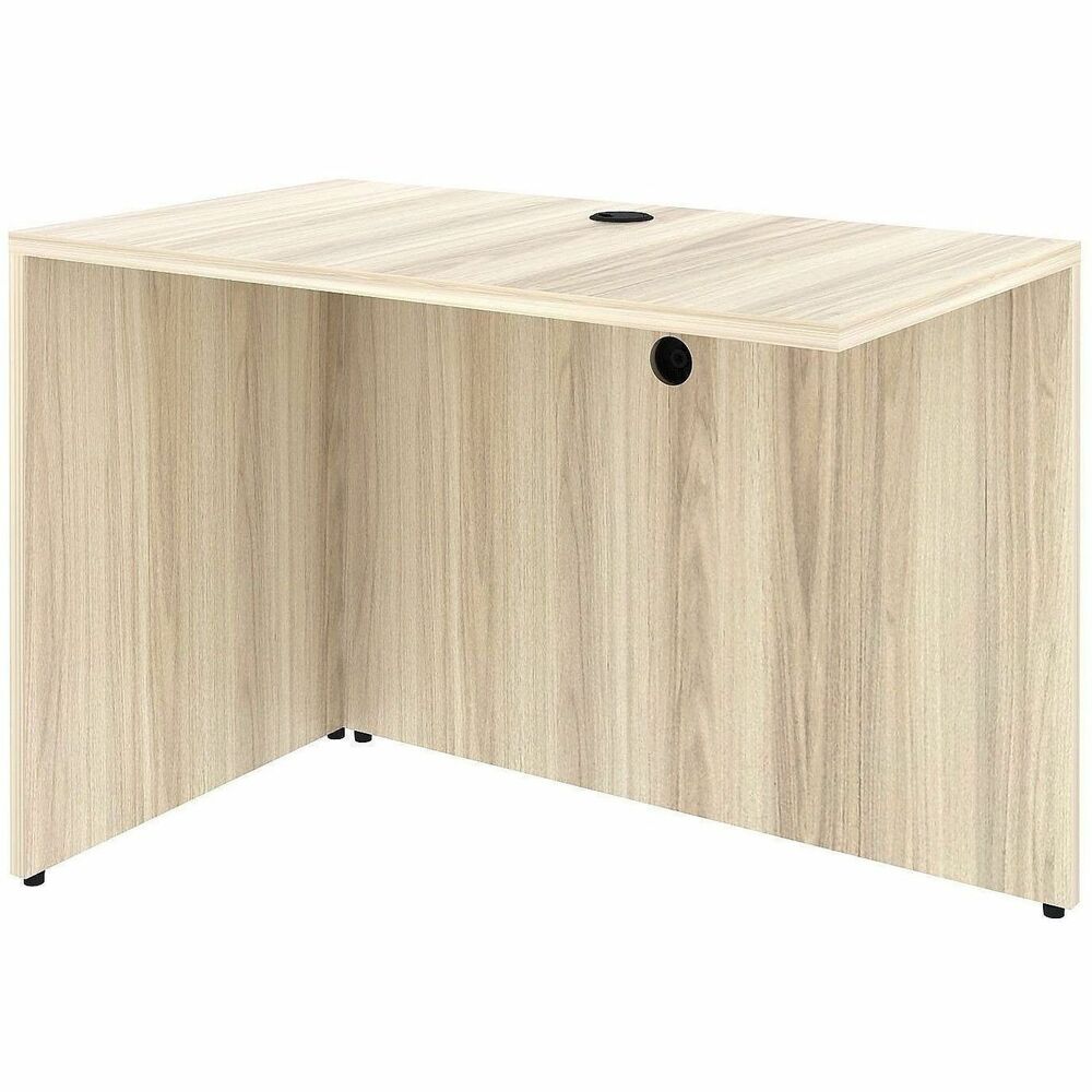 LLR66321 - Rectangular return shell is part of Lorell Essentials Series Laminate Furniture with high-quality laminate construction and metal-to-metal, cam-lock connections. Modern Elm laminate top is 1" thick for durability. Use the grommet hole in the top for easy cord routing. Design also includes a full modesty panel for privacy, 3mm PVC edges and adjustable feet.