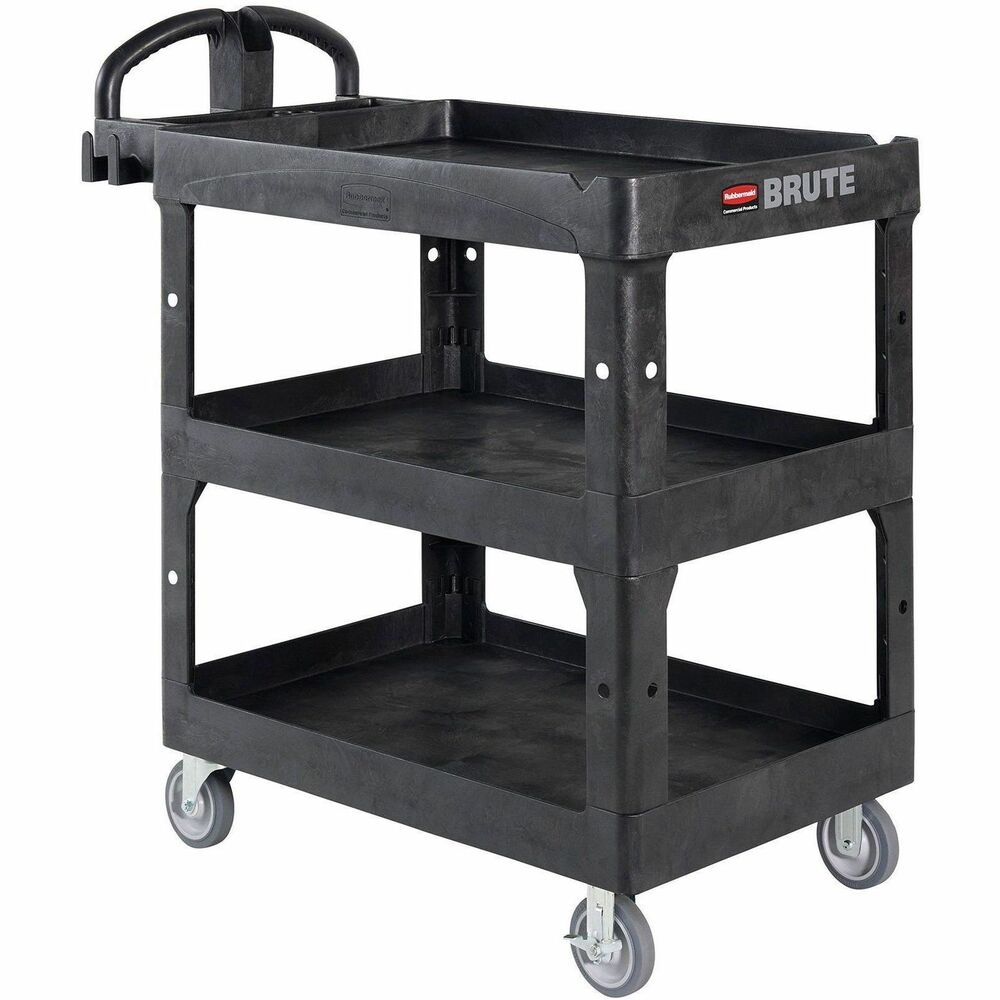 RCP2196862 - The BRUTE Heavy Duty Medium 3-Shelf Utility Cart with a lipped shelves is a durable versatile cart that is ideal for transporting materials, supplies, and heavy loads up to 600 lb. Cart provides 50% more storage capacity to help move more materials efficiently throughout a facility. The lipped shelves prevent items from falling off the cart and features an integrated V-notch to hold pipe and conduit securely for safe cutting, and cart features 12" shelf clearance between each shelf to optimize use of additional storage capacity.Features and Benefits:Provides 50% more storage capacity to help move more materials efficiently throughout a facility.Patented ergonomic handle provides optimal hand placement and makes the cart easy to control.Durable structural foam construction is lightweight and maneuverable with 600 lb of storage weight capacity.Designed at the ideal height for light or precision work activities.Lipped shelf features integrated V-notch to hold pipe and conduit securely for safe cutting.Features two 5" fixed locking casters, and two swivel casters that keeps the cart in place when loading and unloading.Built-in tool holster and caddy keep items at hand and in place during transport.Easy-reach tool/accessory hooks provide additional storage.12" clearance between shelves.Drill free assemblyWhen compared to the surface area of RCP's 2-Shelf Heavy-Duty Ergo Utility Cart Medium (FG452088BLA)