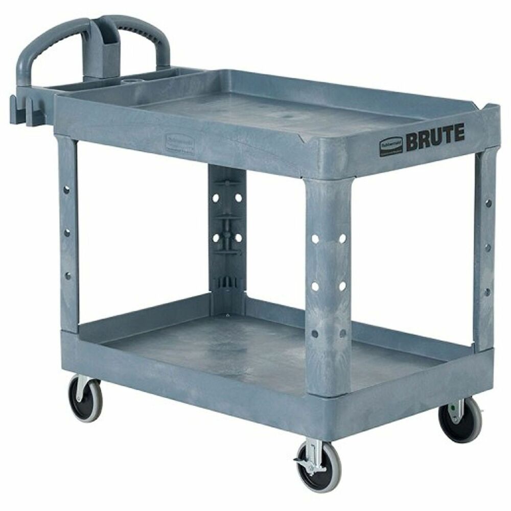 RCP2192464 - The BRUTE Heavy-Duty Utility Cart with Lipped Shelf transports materials, supplies, and heavy loads securely. The lipped shelves prevent items from falling off the cart and features an integrated V-notch to hold pipe and conduit securely for safe cutting. High-density structural foam construction makes this two-shelf rolling cart sturdy, lightweight, and maneuverable. It won't rust, dent, chip or peel and can support up to 500 lbs. Ergonomically superior design with integrated storage and organizational features allows users to work smarter, faster, and safer.Features and Benefits:Premium ergonomic handle provides optimal hand placement to improve controlFeatures two 5" fixed locking casters and two swivel casters that keep the cart in place when loading and unloadingDesigned with rounded corners to protect furniture, walls, and doorwaysDurable structural foam construction is lightweight and maneuverable with 500 lbs. of storage weight capacityLipped shelf features integrated V-notch to hold pipe and conduit securely for safe cuttingDeep pocket shelves to keep loads secureBuilt-in tool holster and caddy keep items at hand and in place during transportMolded-in fittings allow you to add pipe or rods to hold wire spools and other roll-type goodsEasy-reach tool/accessory hooks provide additional storageReplacement parts:3485097 - Caster Kit, FG4500M1BLA - Universal Cart Lag - Black, FG4500M20000 - Hardware Kit, FG4510L30000 - Utility Cart Hardware Kit, 2110124 - Handle, FG4501L10000 - 5" Fixed Caster, FG4501L20000 - 5" Swivel Caster (For more info: visit www.specialmade.com)10-Year Limited Warranty
