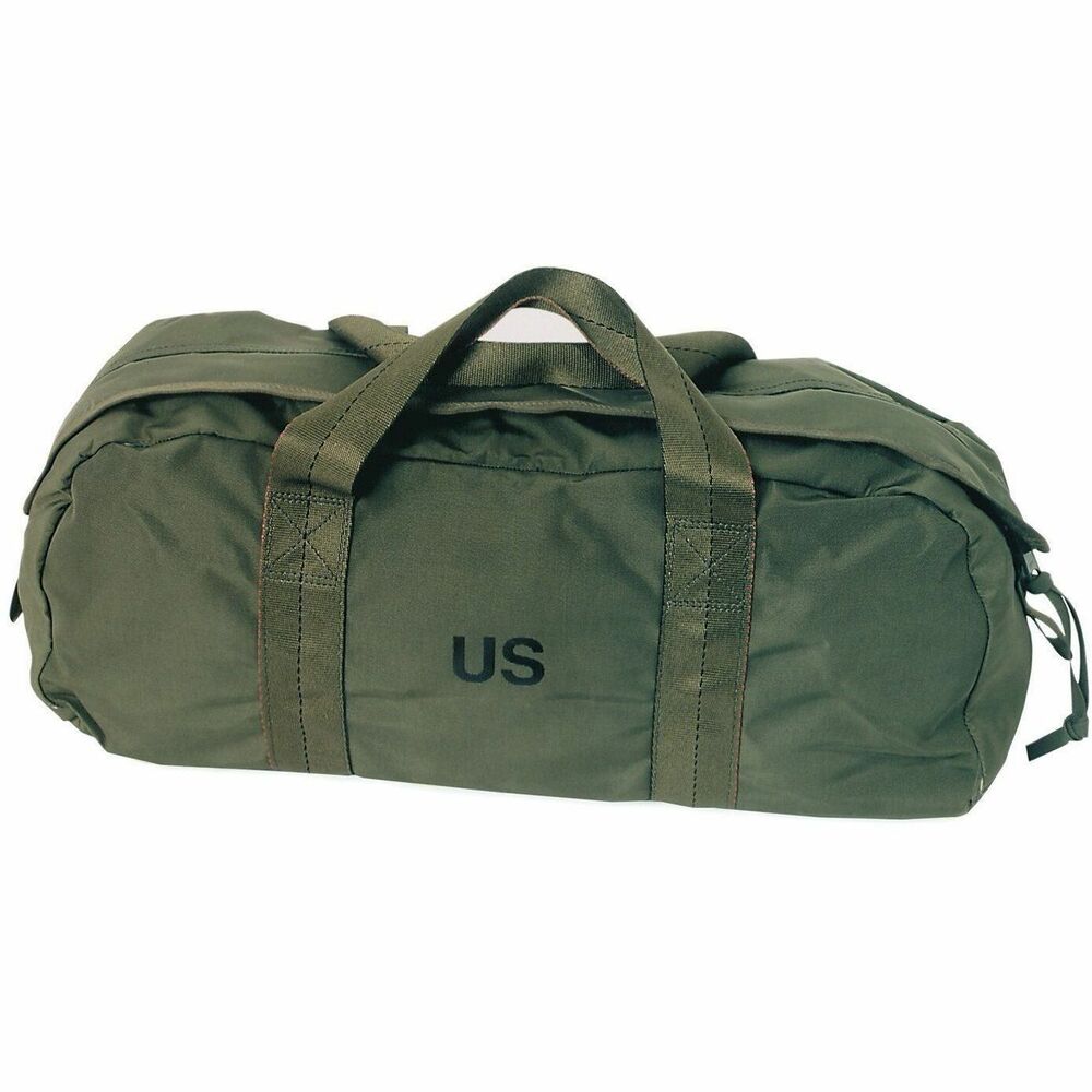 NSN4736256 - Sturdy carrying bag made of cotton duck cloth. Bag has two back pockets with slide fastener closure and two nylon web handles. 