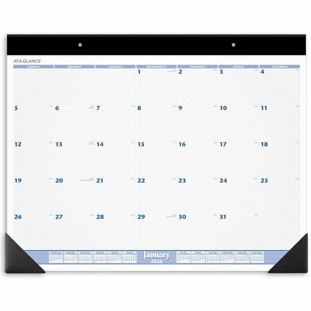 AAGSW23000 - Desk pad protects your desk and keep up-to-date with classic styling. Dated planning pages range 12 months from January to December. One-page-per-month format includes ruled daily blocks (3-1/4" x 2-3/4"), Sunday-through-Saturday scheduling, count of days/days remaining, and full-year calendar reference along the bottom. Desk pad is framed with a wide black headband and black ploy corners. Use eyelets in the headband for hanging. Calendar pages are perforated for clean tear-out and printed in blue and gray ink on quality paper.