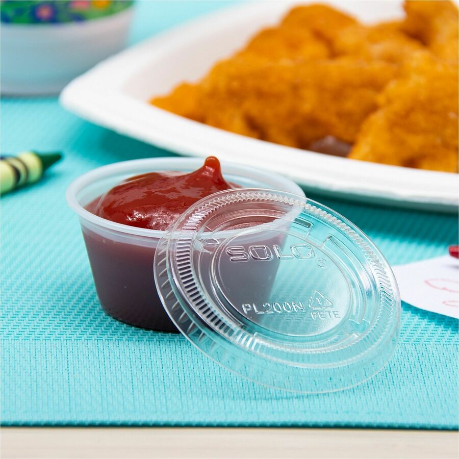 Solo 2 oz (59.1 mL) Clear Lid - 2.6" Diameter - Polyethylene Terephthalate (PET) - Clear - 2500 / Case