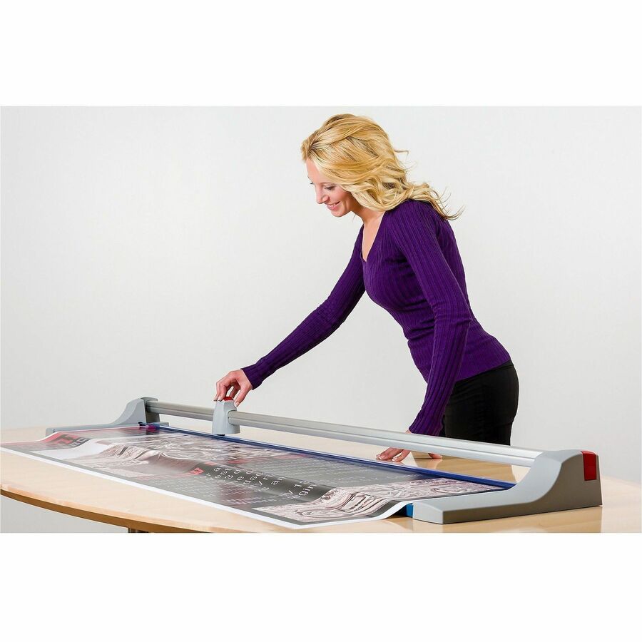 DAH472 - Rotary trimmer with a 72" cut length features a durable, self-sharpening blade to help you precisely trim thicker material. Automatic clamping system provides even pressure to prevent your work from shifting. Base contains carefully screened guides to help align your cuts. Guides indicate inch and metric measurements for all your trimming needs. Blade's precision-graduated edge will remove even the tiniest sliver of paper and produce a clean, burr-free cut. Sturdy metal base provides a solid foundation that will never warp or crack. Rotary trimmer is designed to cut up to 12 sheets at a time. More from the Manufacturer