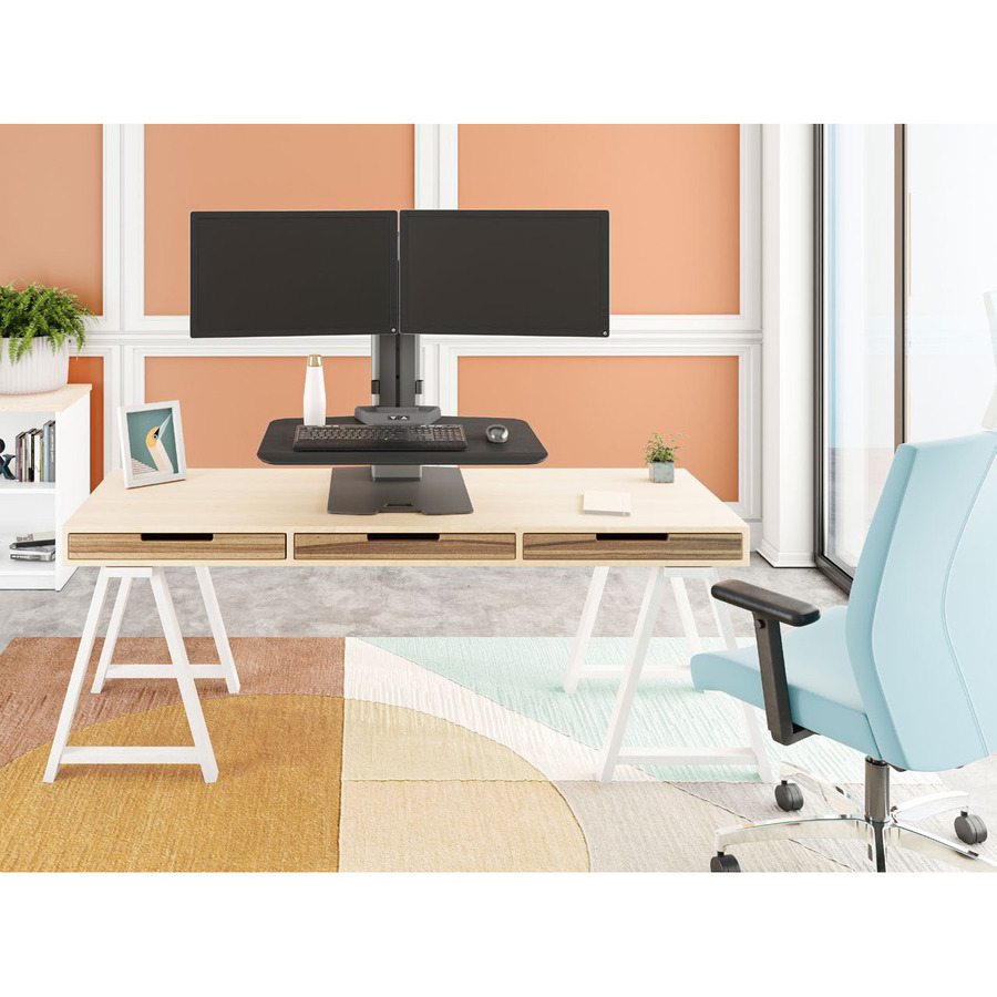 THE WINSTON-E SIT-STAND DUAL MONITOR MOUNT WITH COMPACT WORKSURFACE OFFERS ELECT — life-style view