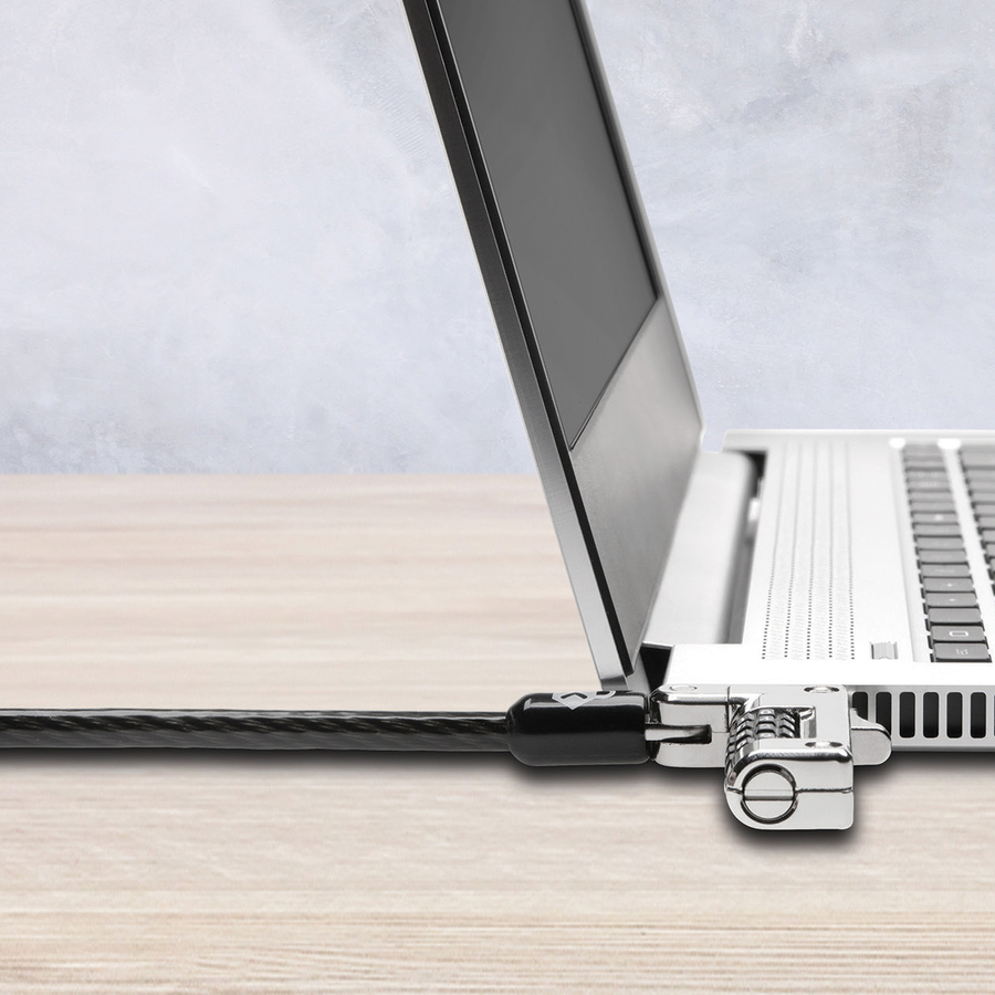 NSN6952546 - Combination Laptop Security Cable Lock offers uncompromised, keyless security for ultra-thin laptops built with the Kensington Nano Security Slot. Compatible across all Kensington's latest locks, this 5mm keying system includes a tough lock head with Cleat Locking technology. Resettable, four-number combination lock offers 10,000 different combination codes that can be selected by you so it's personalized and more easily remembered. Offering the same level of cut-resistance and theft-resistance as thicker cables, the carbon steel cable with a plastic sheath offers security and greater mobility with 6' of cable and anchors to your desk, table or any fixed structure. Online code registration program allows quick, secure and easy combination lookup if it is ever forgotten. Lock is TAA complaint.