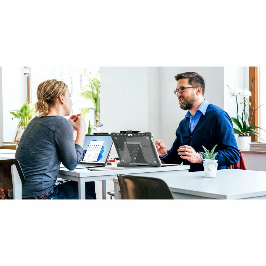 Gray rugged SHIELD EXTREME X2 case for Microsoft Surface Pro 8 with integrated screen protection and kickstand — life-style view