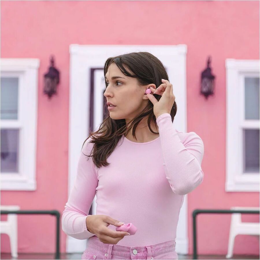 JLab GO Air Pop true wireless earbuds in pink with charging case — life-style view