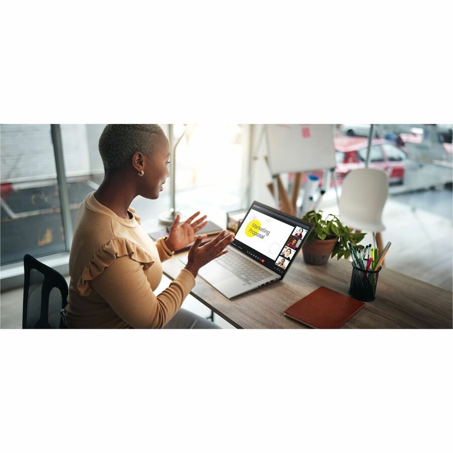 ASUS Chromebook Plus CX5403CMA-DB586 silver laptop with 14-inch WQXGA non-touch display — life-style view