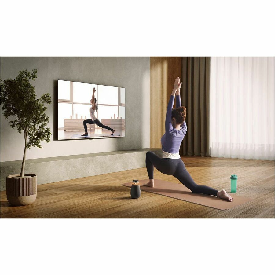 LG XBOOM 360 XO2 black wireless speaker with 360-degree sound and IP55 protection — life-style view
