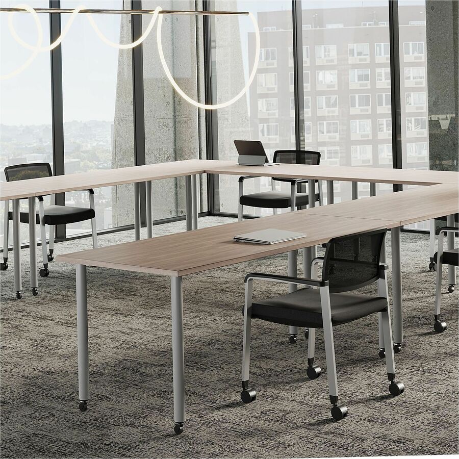 LLR66354 - Multipurpose tabletop configures to meet your needs. Laminate exterior matches other units and bases for a cohesive, professional look. Combine this rectangular top with a base to create the working surface you need whether a height-adjustable desk or a standard-height training table. 1" thick tabletop made of particleboard features a 3mm thick PVC edgebanding that matches the laminate finish on the top surface.