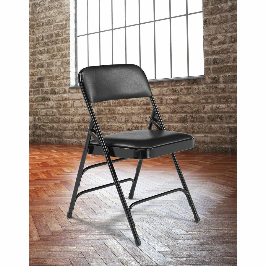 National Public Seating 1300 Series Upholstered Folding Chair - Midnight Black Seat Color - Plush, High Density Foam (HDF), Vinyl Seat Material - Midnight Black Back Color - Plush, Vinyl, High Density Foam (HDF) Back Material - Black Frame Color - Tubular