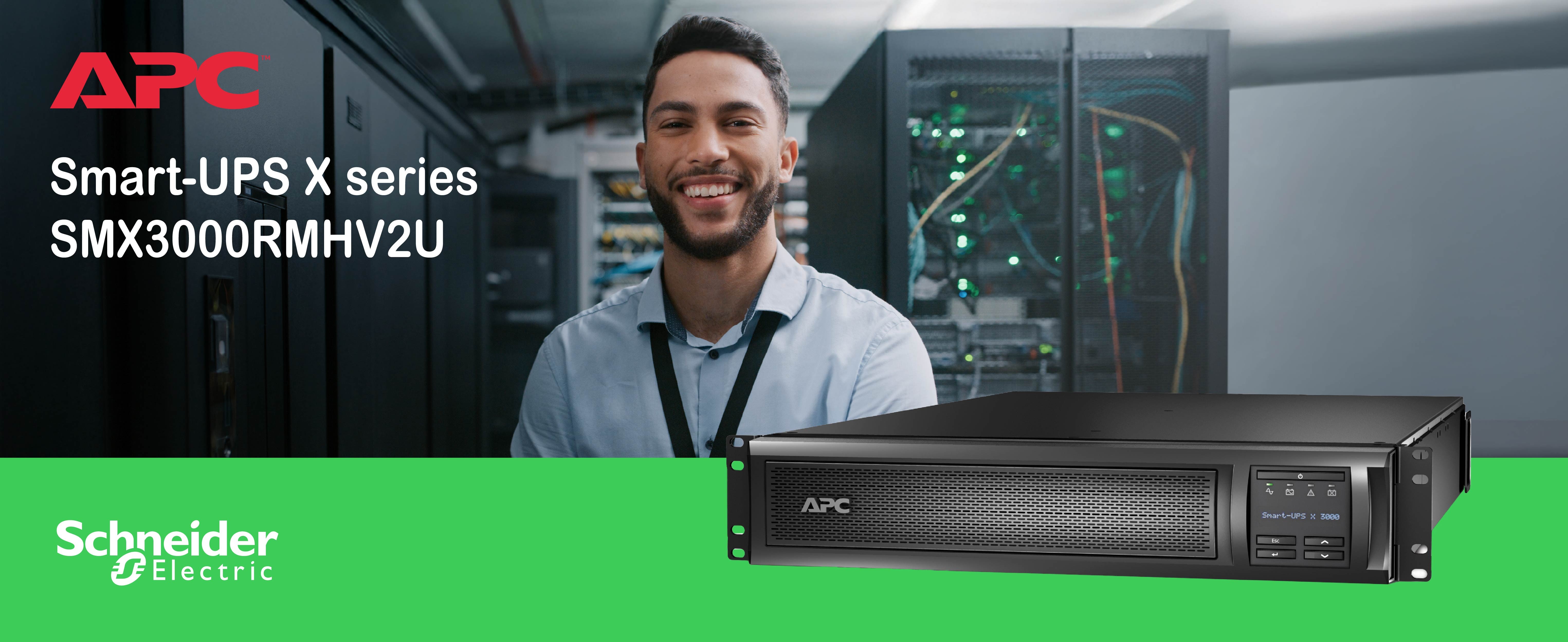 man in a data centre in the background