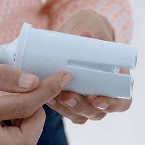 2. Insert the Brita filter into the reservoir, lining up the notch in the Brita pitcher with the groove in the filter.
