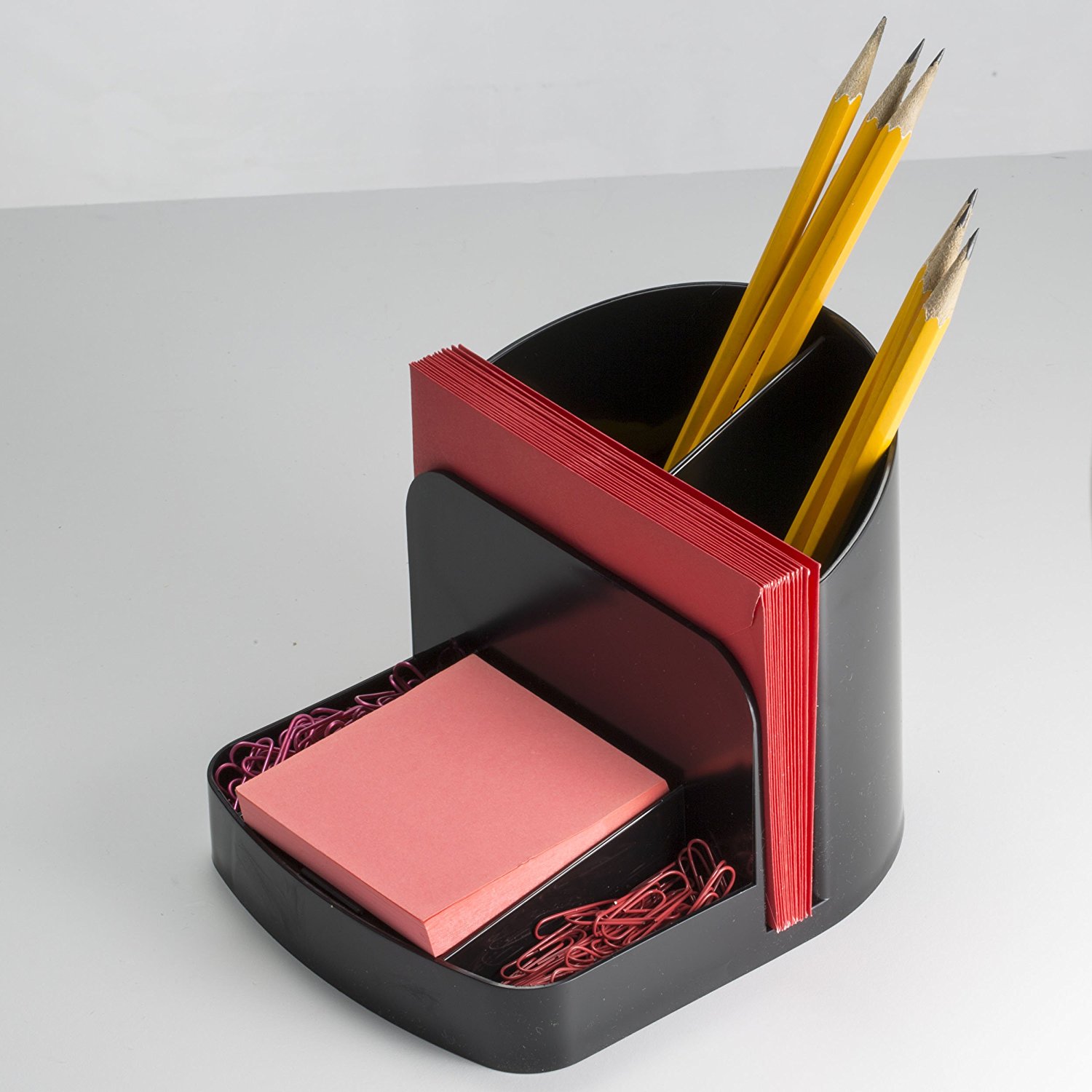 Two small compartments for clips, eraser, or similar items plus space for envelopes or memos